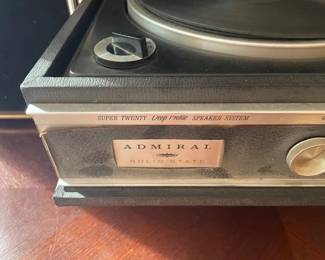 Vintage portable Admiral record player with speakers.