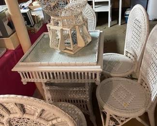 Vintage white wicker table and chairs.