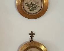 Pair of decorative wall hangings.