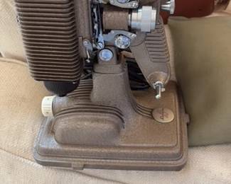 Vintage Revere model 85 eight 8mm movie projector with cord, case & cord.