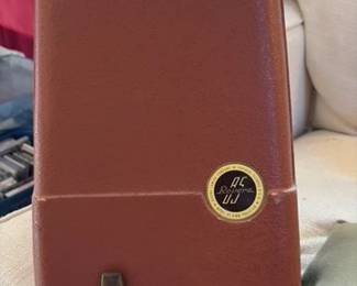 Vintage Revere model 85 eight 8mm movie projector with cord, case & cord.