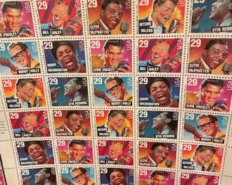 Large selection of postage stamps (full sheets, uncirculated).
