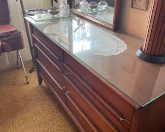 Willett eight-drawer low boy teak dresser with mirror.