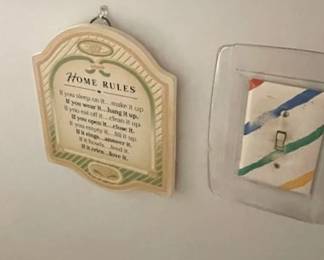 "Home Rules" plaque.
