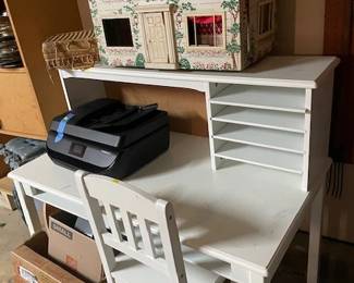 Child's desk and dollhouse.