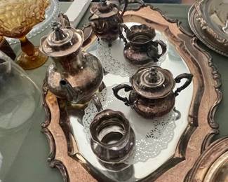 Silver-plate coffee and tea service.