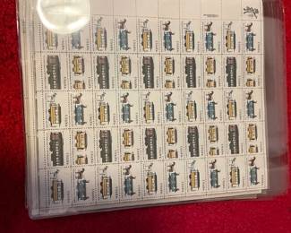 Large selection of postage stamps (full sheets, uncirculated).