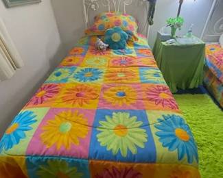 Pair of white iron beds and pair of vintage groovy bedspreads.