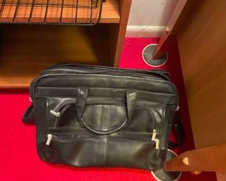 Black leather briefcases.