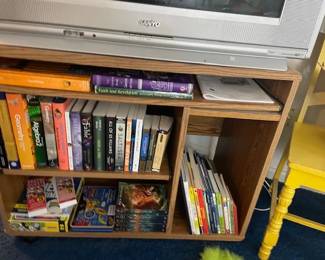 Small shelf with books.
