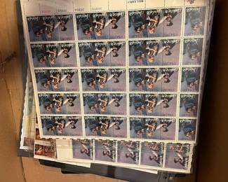 Large selection of postage stamps (full sheets, uncirculated).
