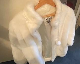 Short faux fur jacket.
