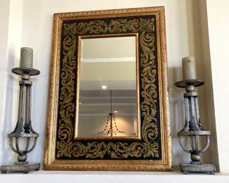 One of numerous mirrors; tall candle holders