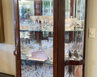 Lighted china cabinet filled with beautiful crystal
