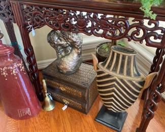 Ornately carved  table and accessories