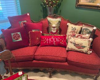 Red sofa and decorative pillows