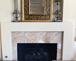 One of numerous mirrors; tall candle holders