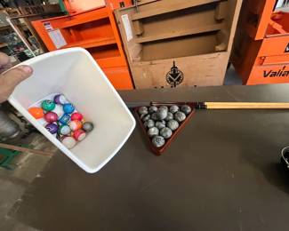 billiard balls (2 sets) and cues