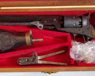 Musket revolver, with bullet mold and powder pouch. Presented as a gift at a show in San Francisco featuring The Jackson 5 by Motown.