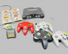 Vintage Nintendo 64 Game Console with 4 Controllers (3 Original N64 Controllers) Nine Games and a Nintendo Transfer Pak
