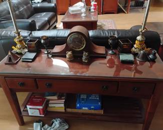 behind the sofa table plus items on the table