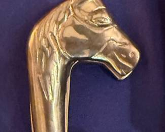 Brass horse head clip
