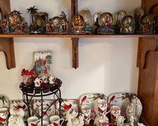 Lots of snow globes & Christmas red birds