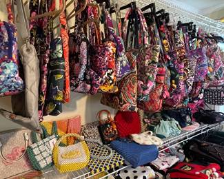 Dozens of Vera Bradley purses