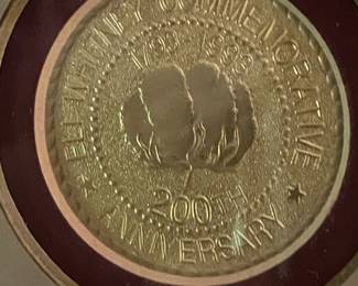 Seal commemorating 200th anniversary of Eli Whitney's invention of cotton gin