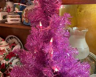 1 of 3 small pink tinsel trees