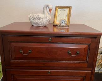 This is a wonderful wooden file cabinet