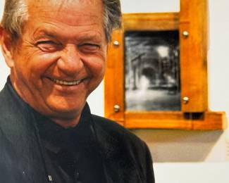 Photo of Bruce Giffin with his work