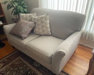 . . . neutral-colored loveseat