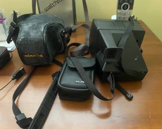 . . . vintage cameras -- Minolta, Polaroid