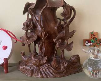 . . . wood-carved figure