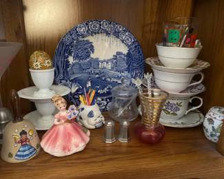 . . . decorative plate -- might be a Royal Doulton girl w/flowers