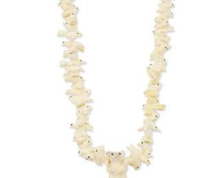 348
A Zuni Pueblo-style carved bone fetish necklace
Late 20th century
A chunky necklace with a central standing bear flanked by stacked carved bone animals including birds, turtles, squirrels, bison, rabbits, frogs , and bighorn sheep, with a traditional wrapped neck cord
28" L
76.6 grams gross
Estimate: $200 - $400