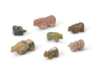 282
A group of Zuni carved stone bear fetish figures
Mid/late 20th century
Each unmarked
Comprising seven bear figures, each with turquoise inlaid eyes and mounted with offerings
7 pieces
Largest: 2.125" H x 4.875" W x 2" D
Estimate: $200 - $400