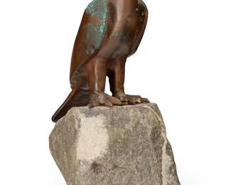 335
Charles Reussner
1886-1961
Eagle perched
Patinated bronze and carved stone
Signed in the casting to figure's tail feather: Reussner; with sticker to underside: Made in Switzerland; additional sticker: Tecolote Book Shop
Overall: 9.375" H x 4.5" W x 5.75" D
Estimate: $200 - $400