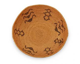110
A Paiute pictorial basket
Early 20th century; Central California
The coiled basket with brown alternating columns of figural elements
4.25" H x 11" Dia.
Estimate: $800 - $1,200