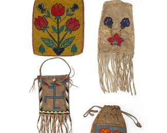 240
A group of Native American beaded hide bags
Early/mid-20th century
Comprising a trade cloth-lined bag with hide handles, adorned with beads to front depicting three tulips, a possibly Inuit handled bag with beaded floral motifs and lower fringe, a possibly Apache flap-front handled bag with beaded whirling log motif and lower fringe with tin cones, and a Plateau sack with drawstring and beaded front panel depicting poppies
4 pieces
Largest: 11.25" H x 9.875" W; Smallest: 8" H x 6.25" W
Estimate: $600 - $800
