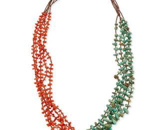 322
A Southwest Pueblo multistrand coral and turquoise necklace
Mid/late 20th century
A delicate five-strand necklace with half turquoise nuggets and half branch coral beads, with fine heishi spacers and silver cone clasp
33 1/2" L
124.3 grams gross
Estimate: $400 - $600