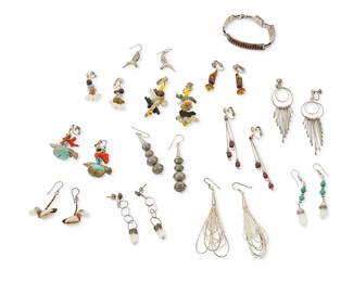 366
A group of Southwest jewelry
Mid/late 20th century
Many marked for sterling
Thirteen works comprising a Zuni-style narrow silver and petit point coral link bracelet, together with four pairs of earrings, each with carved stone fetish animals and turquoise and coral beads in different arrangements, plus a pair of sterling silver hummingbird earrings, a pair of chunky silver bead earrings and a pair of liquid silver earrings, and five further pairs of earrings designed with silver wire, beads, and crystals, 25 pieces
Bracelet: 7" L x 3/8" H; earrings: 3 1/8" H to 1 5/8" H
107.0 grams gross
Estimate: $100 - $200