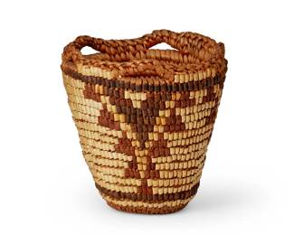 153
A Thompson River polychrome basket
Mid-20th century; Pacific Northwest
The small coiled basket with openwork rim and brown and yellow imbricated geometric motifs
4.5" H x 4.625" Dia.
Estimate: $200 - $400