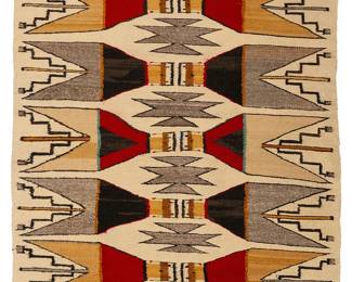 208
A Navajo Yei Bi Chei weaving
Mid-20th century, Diné
Woven in multicolor wool on a cream ground, depicting two rows of Yei Bi Chei spirit figures stacked head to head, with animal figures at corners
37.5" H x 64.5" W
Estimate: $400 - $600