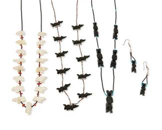 364
Three Zuni Pueblo-style carved fetish necklaces
Late 20th century
Four works comprising a Daisy Leonard Zuni carved bone polar bear fetish necklace with jet and coral beads, as well as a carved jet and bone skunk fetish necklace with heishi and turquoise beads, and a carved jet standing bear fetish necklace with jet and turquoise beads, with a pair of carved jet matching earrings, 5 pieces
Necklaces: 30" L; 28" L; 26" L; earrings: 3 3/8" H
159.4 grams gross
Estimate: $300 - $500