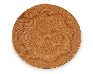 123
A California Mission polychrome basketry tray
Early 20th century; Southern California
The wide coiled plaque with red central zig zag motif and yellow rim
2.375" H x 15.875" Dia.
Estimate: $300 - $500