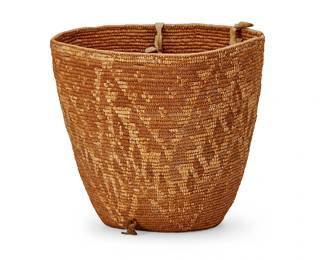 151
A Thompson River burden basket
Early 20th century; Pacific Northwest
The tall coiled basket with imbricated stepped triangle motifs throughout and two hide handles fastened to one side
13.75" H x 14.75" W
Estimate: $400 - $600