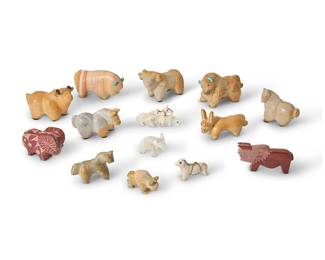 297
A group of Zuni carved stone fetish animal figures
Some variously signed to underside
Each with incised details, some with turquoise mounted accents, comprising two buffalo, four bovine, four horses, three burro, and a bighorn sheep
14 pieces
Largest: 2.125" H x 3.25" W x 1.625" D; Smallest: 1.25" H x 1.875" W x 0.5" D
Estimate: $100 - $200