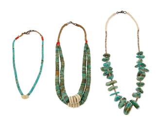 353
Three Southwest Pueblo turquoise necklaces
Mid-20th century
Comprising a small single strand jacla necklace with coral and shell accents, a chunky double jacla collar necklace with coral and shell accents, and a turquoise tab necklace with heishi shell spacers, each with a wrapped neck cord with a hook clasp, 3 pieces
18 1/2" L; 15 1/2" L; 13" L
116.7 grams gross
Estimate: $500 - $700
